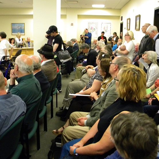 Individuals attending a meeting