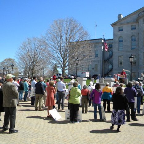 Crowd standing outside a government building